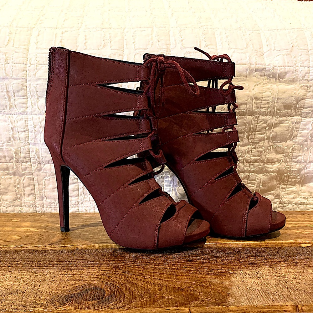 Red lace up high heels/stilettos. Size 8.